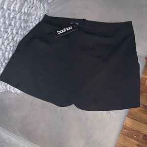Black tulip hem mini skirt